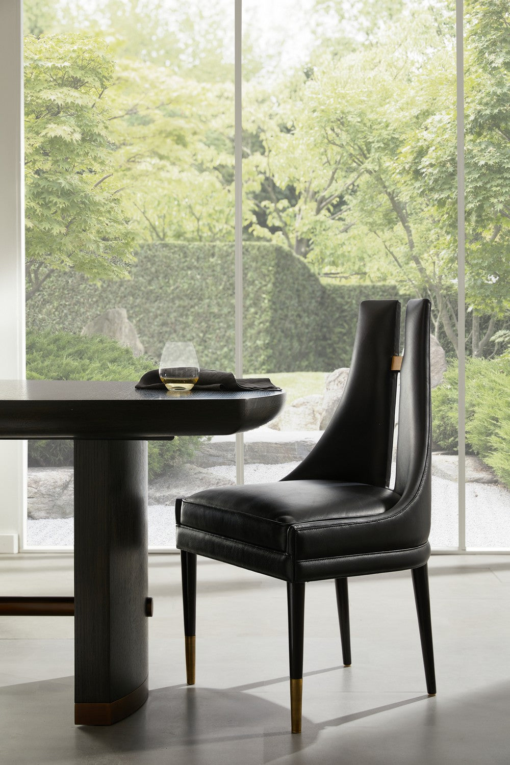 Dining Chair from the Crowley collection in Black/Ebony/Antique Brass finish