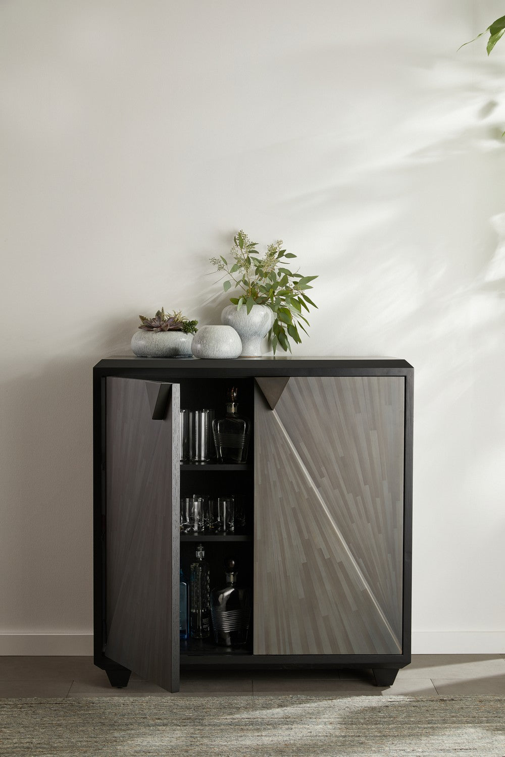 Cabinet from the Ellington collection in Gray Straw Marquetry/Ebony/Bronze finish